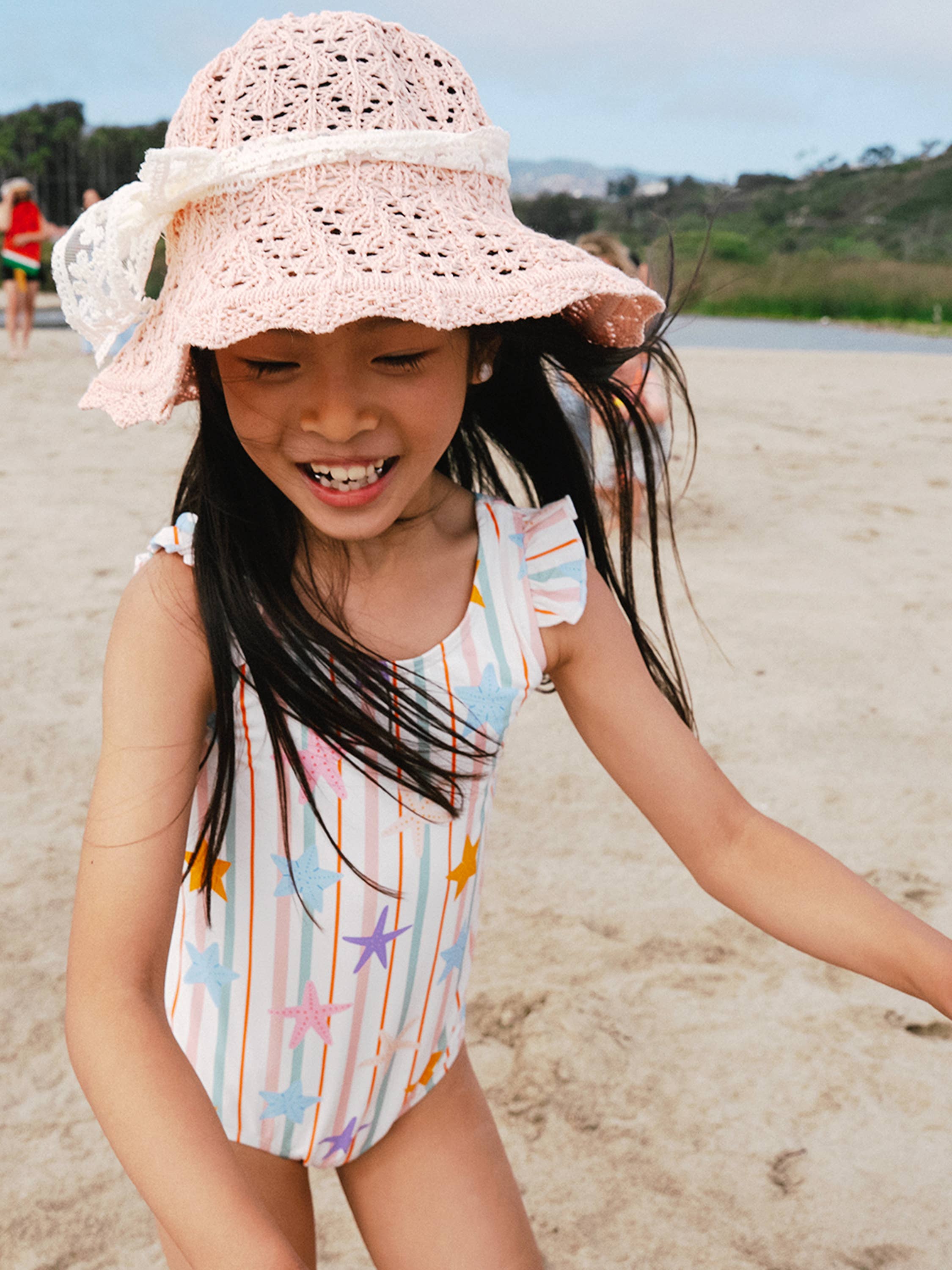 Ruffle One-Piece Swimsuit: Starfish  LAST SIZE 8