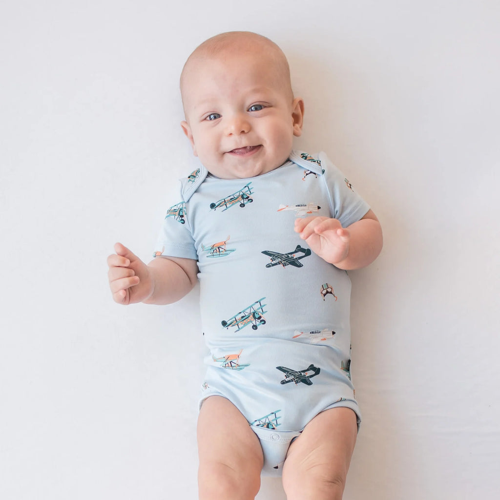 Kyte Baby Bodysuit in Take Off