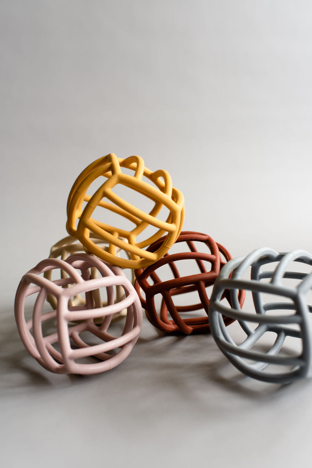 when we wear young - Baby Teether Ball-Rust